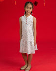 Full length view of the Naomi Cheongsam by Elly featuring an all-over Mahjong print.