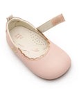 Angled view of a pair of Tip Toey Joey Roundy Shoes in Papaya Cream / Metallic Salmon