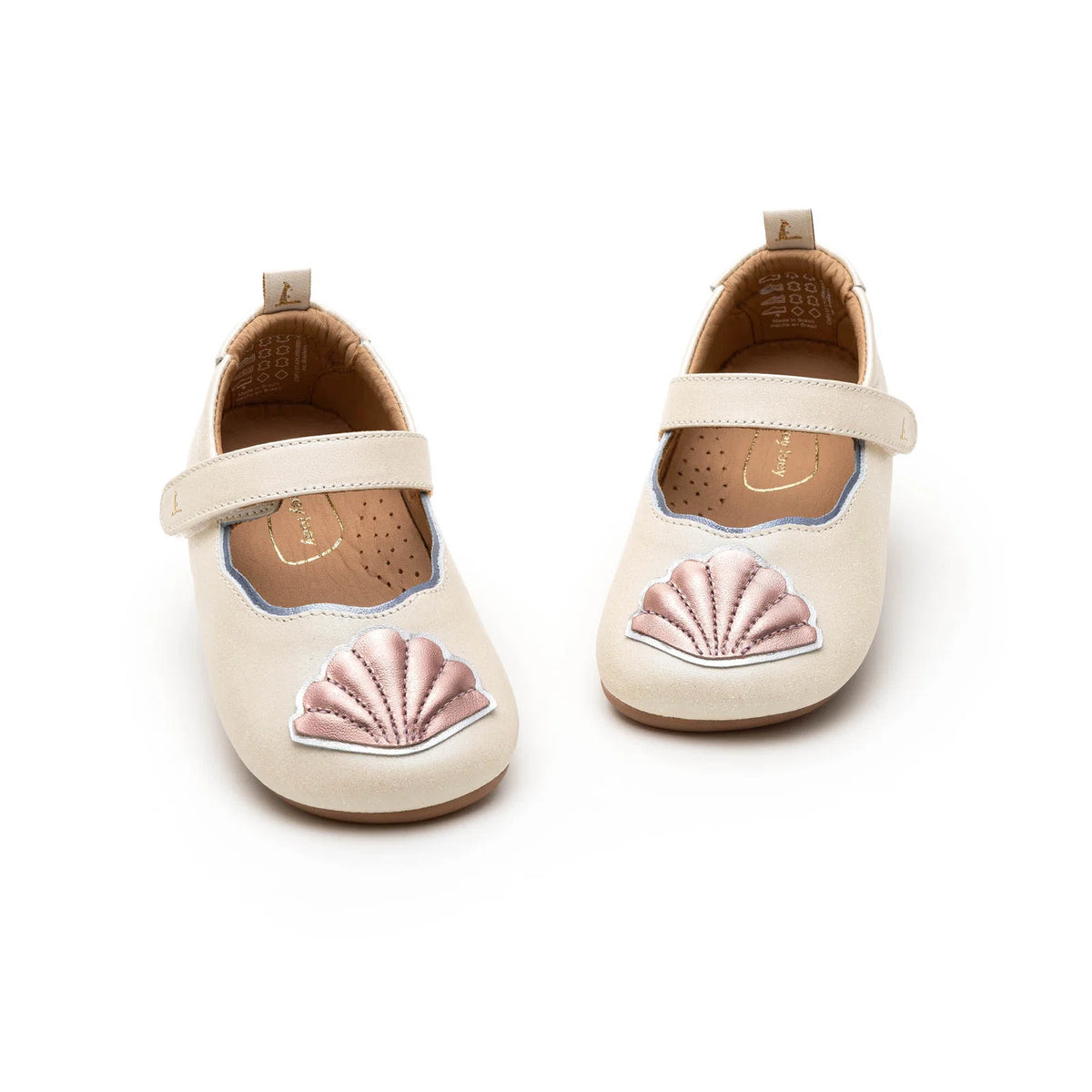 Sole and detail view of Tip Toey Joey Seashell Mary Janes in White Dream / Rose Gold / Metal Blue