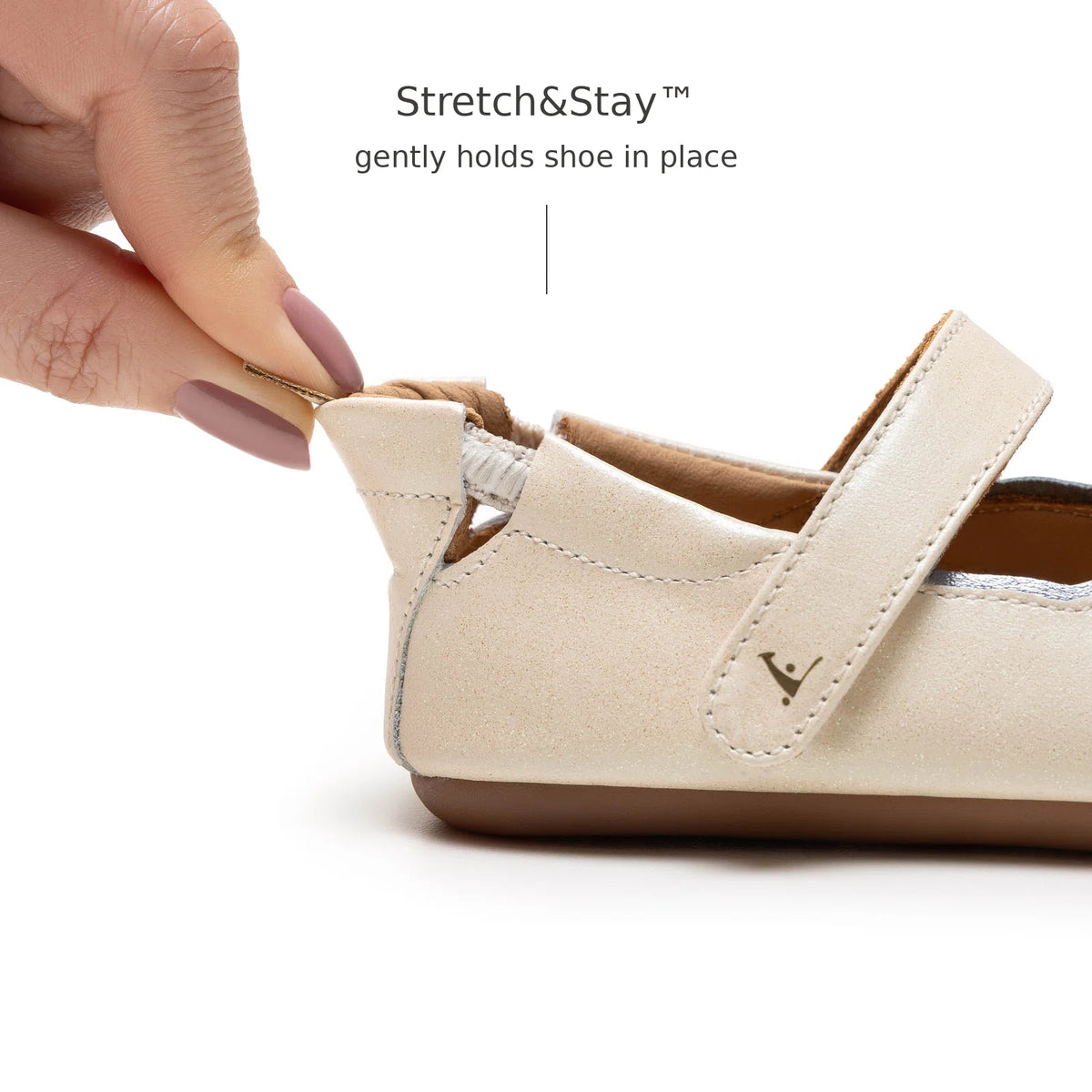 Back view of Tip Toey Joey Seashell Mary Janes in White Dream / Rose Gold / Metal Blue showing the Stretch&amp;Stay elastic heel