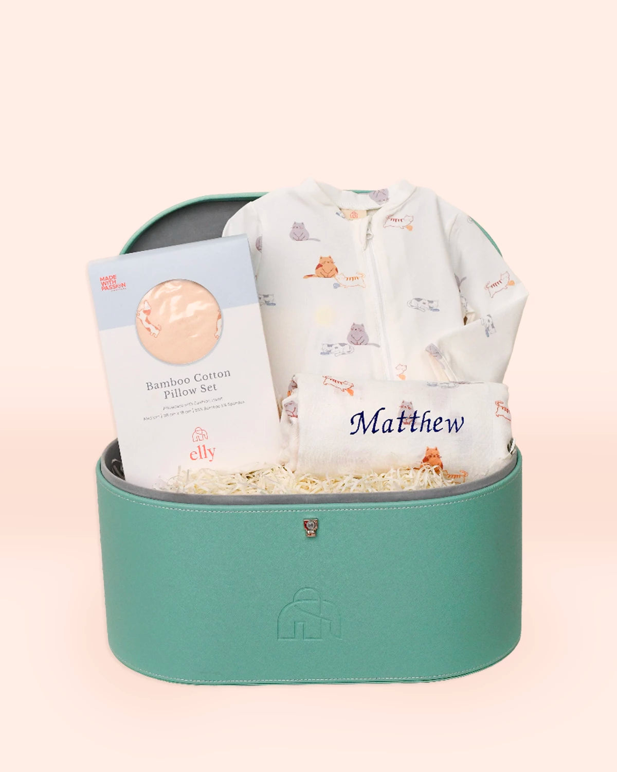 Baby gift set with onesie and pillow in a turquoise box