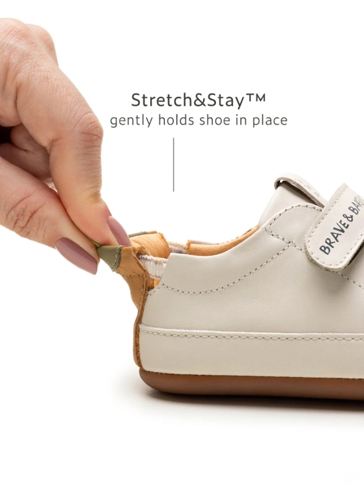 Close-up of the Stretch&amp;Stay elasticated heel on a Tapioca leather sneaker being pulled to show secure fit.