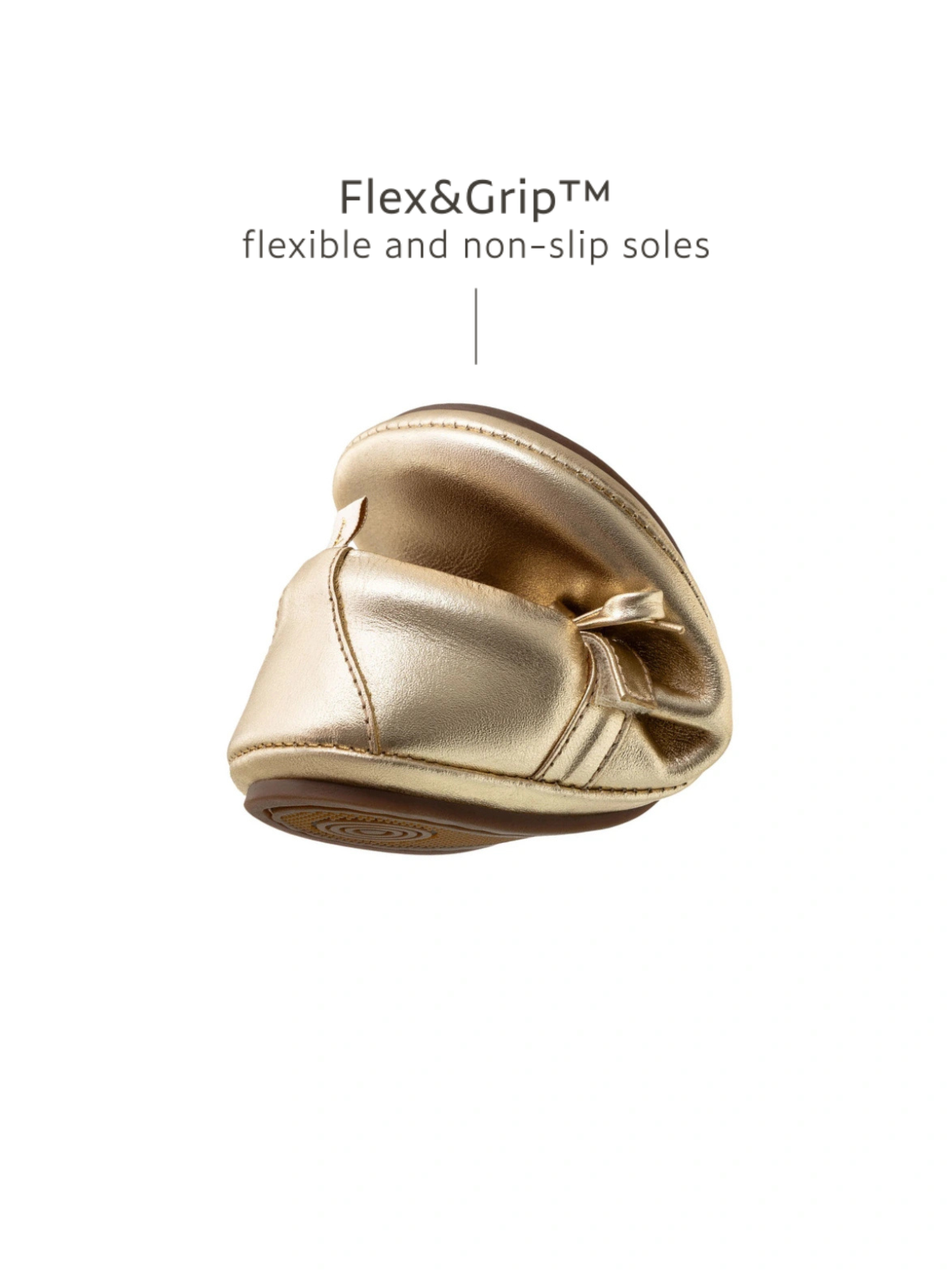 A metal gold Brigitte kids shoe folded in half to demonstrate the flexible Flex&amp;Grip non-slip sole.