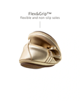 A metal gold Brigitte kids shoe folded in half to demonstrate the flexible Flex&Grip non-slip sole.