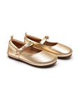 Tip Toey Joey Brigitte kids Mary Janes in metallic gold leather with a thin strap and flexible brown rubber soles.