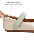 Close-up of the Stretch and Stay elastic heel on the antique white Mary Jane for a secure, comfortable fit on baby feet.