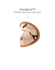 Demonstrating the flexible FlexiGrip sole on the candy dream baby sandal, designed for natural movement and stability.