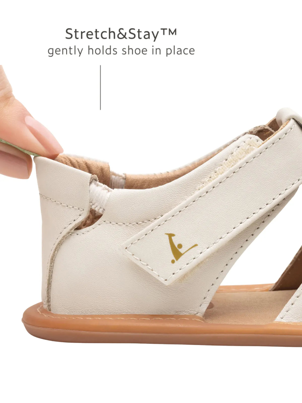 Close-up of the Stretch &amp; Stay elastic heel on the Tapioca baby sandal, designed for a secure and easy fit.