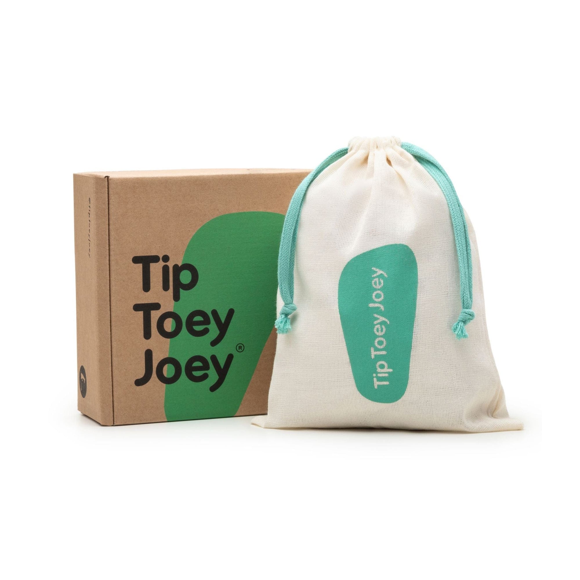 Cotton candy pink baby shoes displayed with the Tip Toey Joey gift box and cotton drawstring storage bag.