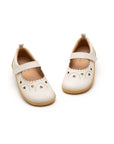 Overhead view of metallic tapioca kids shoes highlighting the wide toe box and scalloped edge detail.