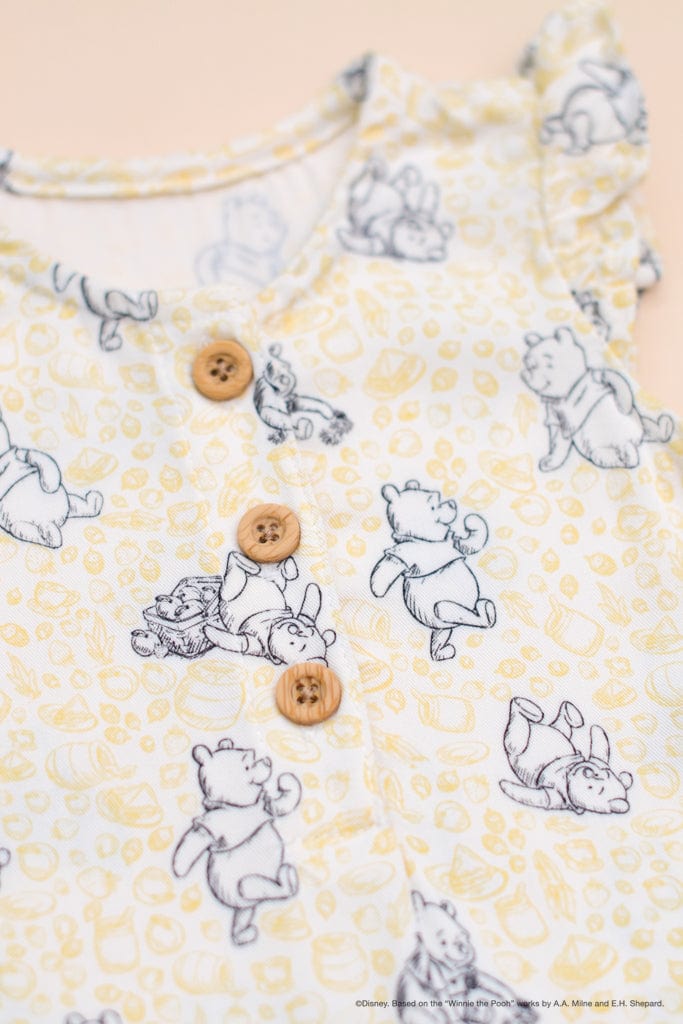 Caitlyn Romper Yellow Hunny Pooh buttons