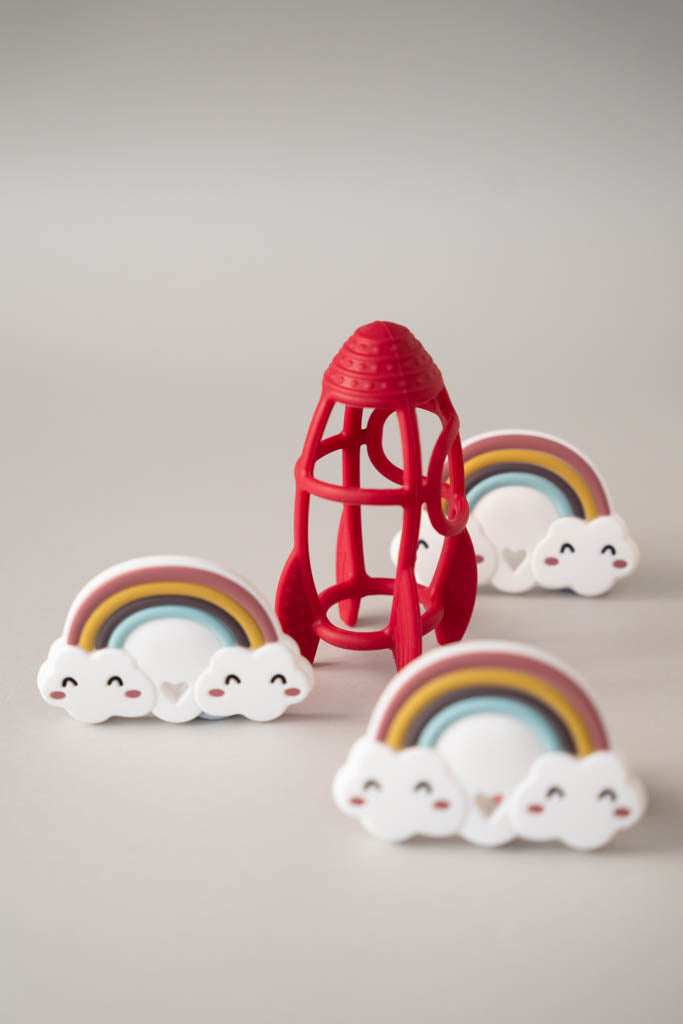 Red rocket with rainbow decorations